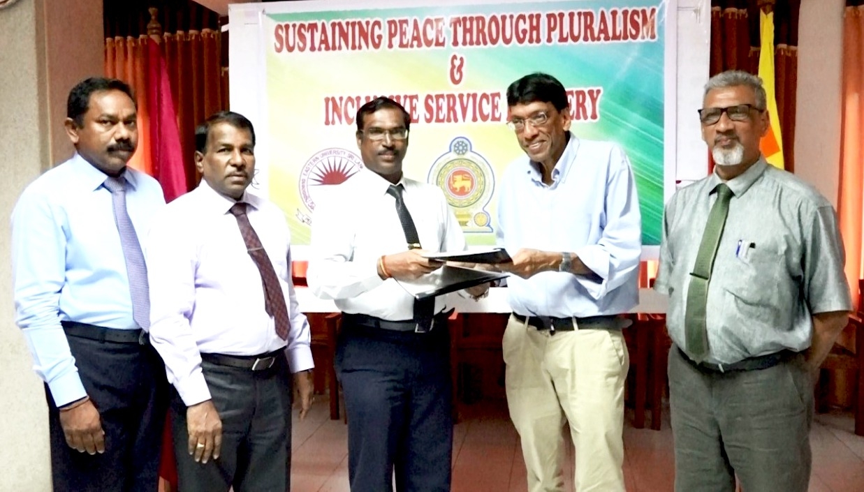 Government Officers Study Pluralism